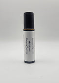 Roll-on bottle labeled 'Blue Dew' on a white background