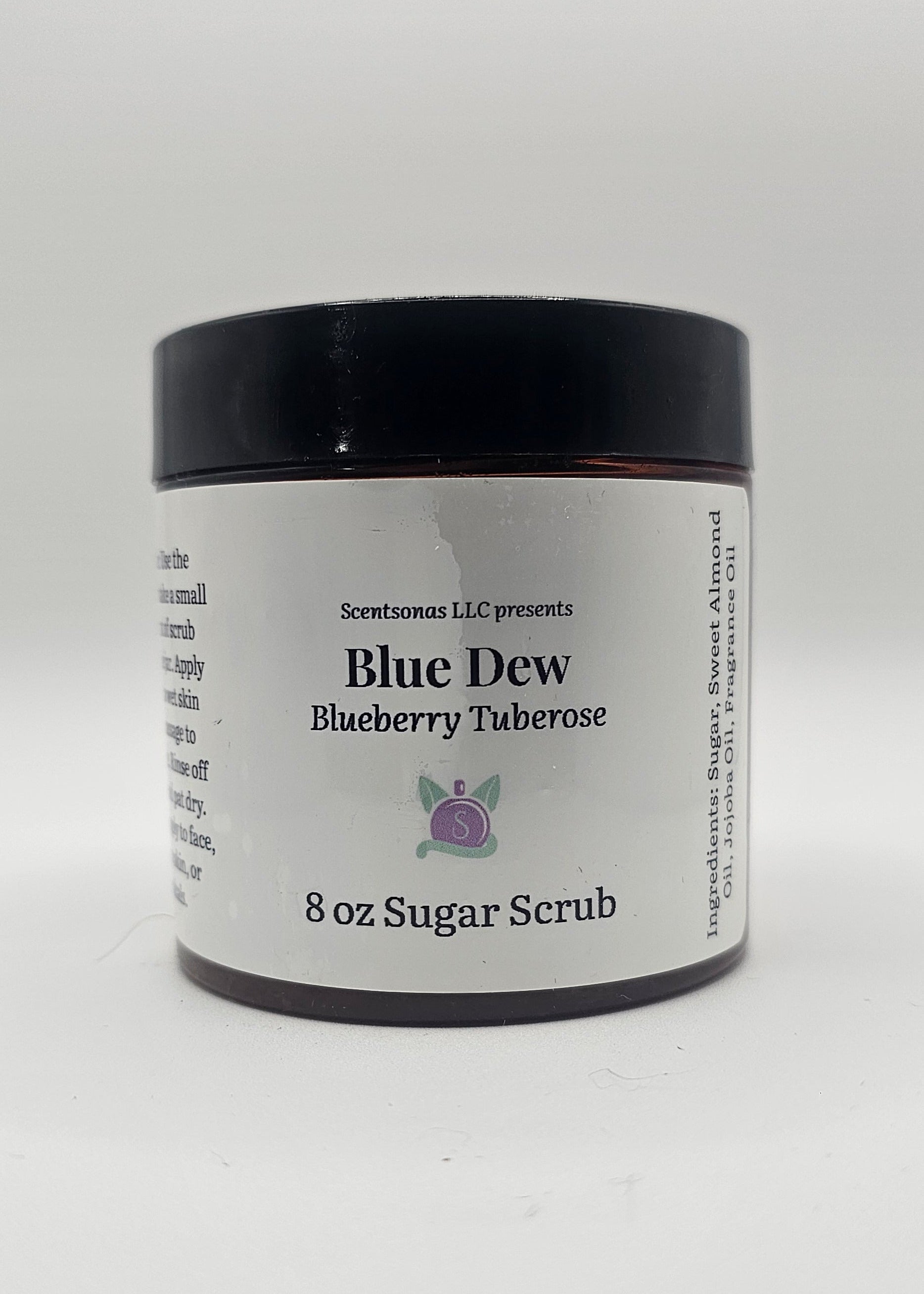 Jar of Blue Dew sugar scrub on a white background