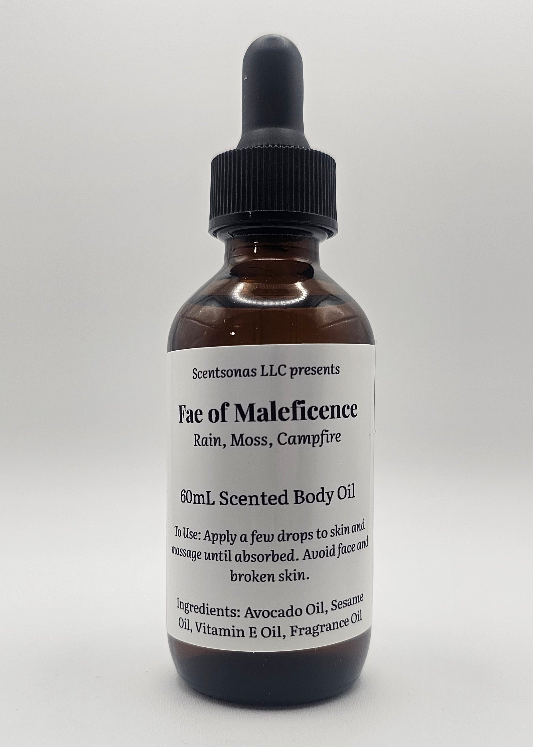 Bottle of Fae of Maleficence body oil on a white background