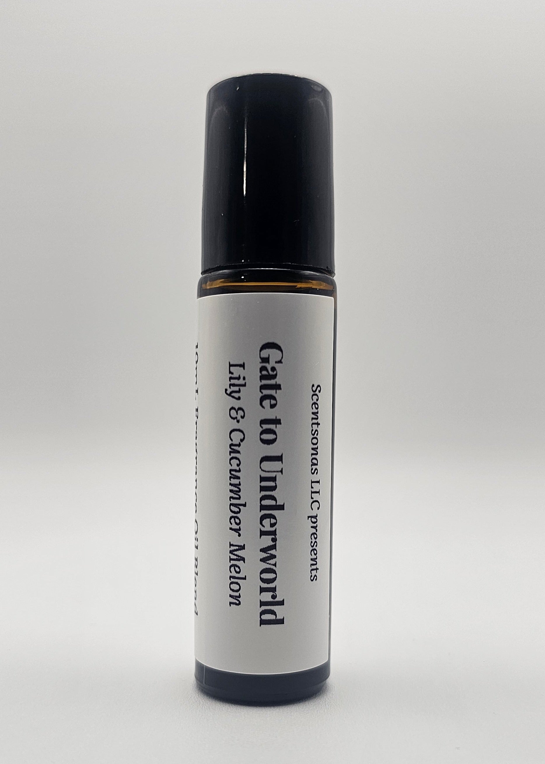 Roll-on bottle labeled 'Gate to Underworld' with 'Lily & Cucumber Melon' on a white background
