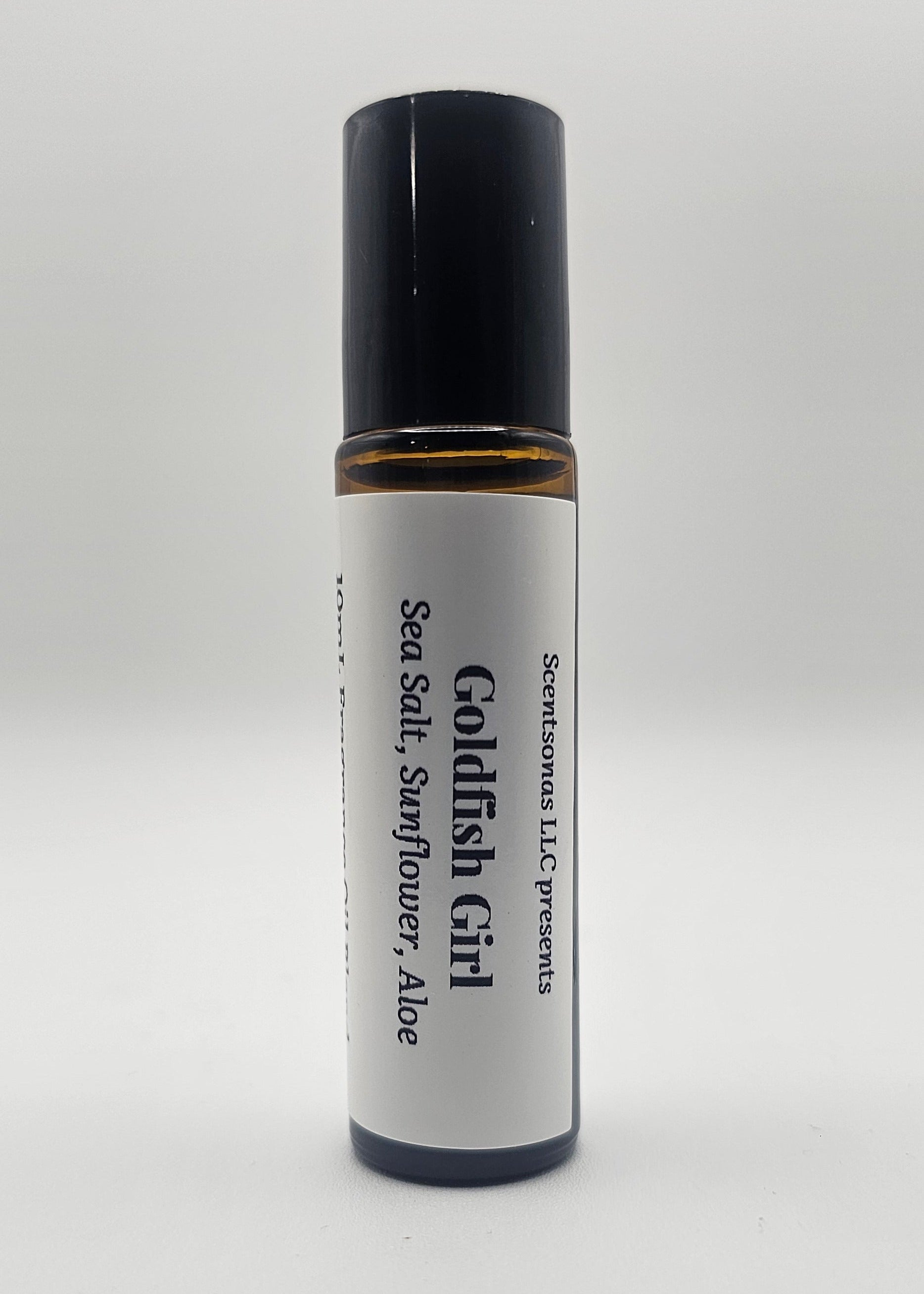 Roll-on bottle labeled 'Goldfish Girl' on a white background