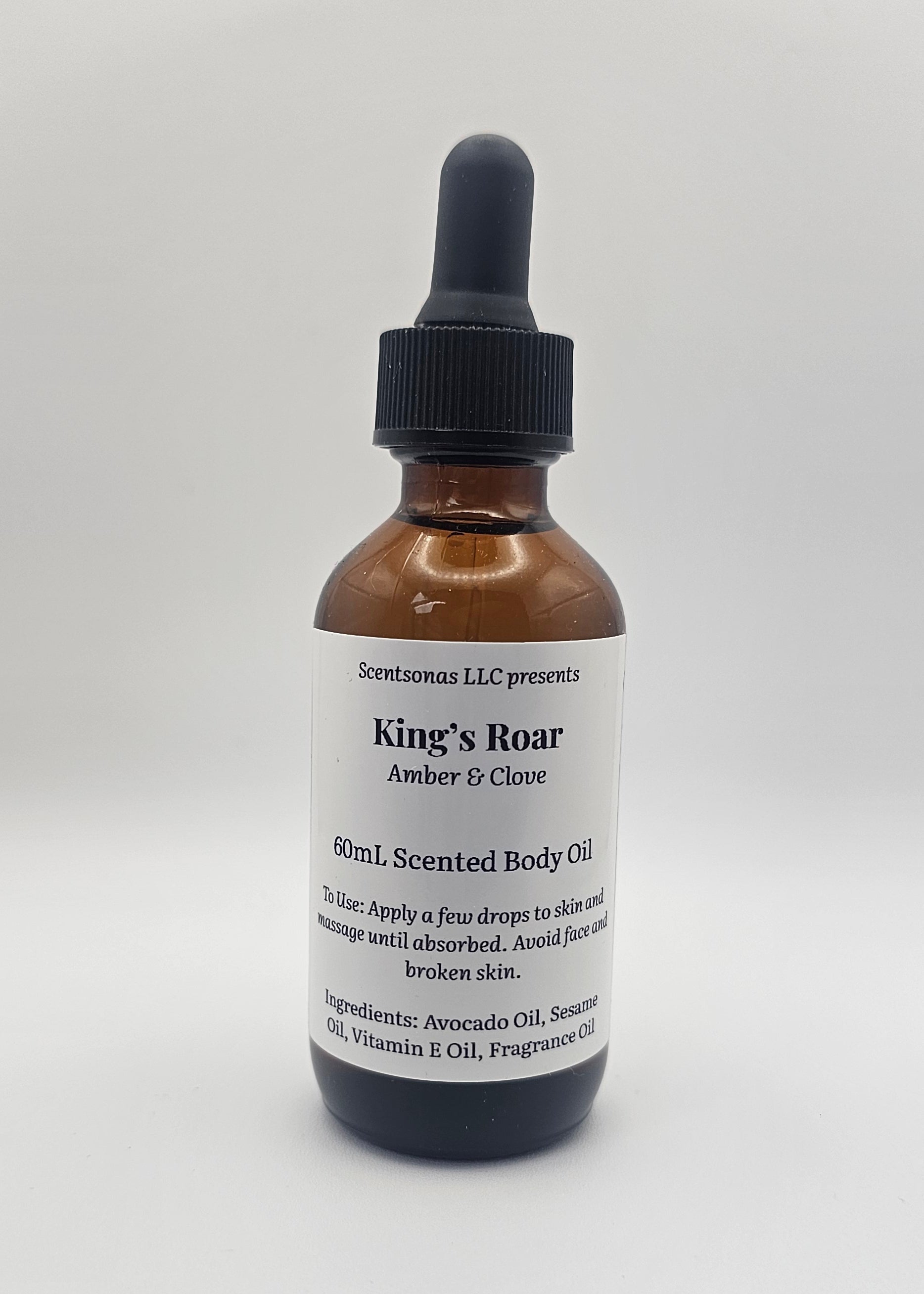 Bottle of King's Roar body oil on a white background