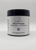 Jar of River Dragon sugar scrub on a white background