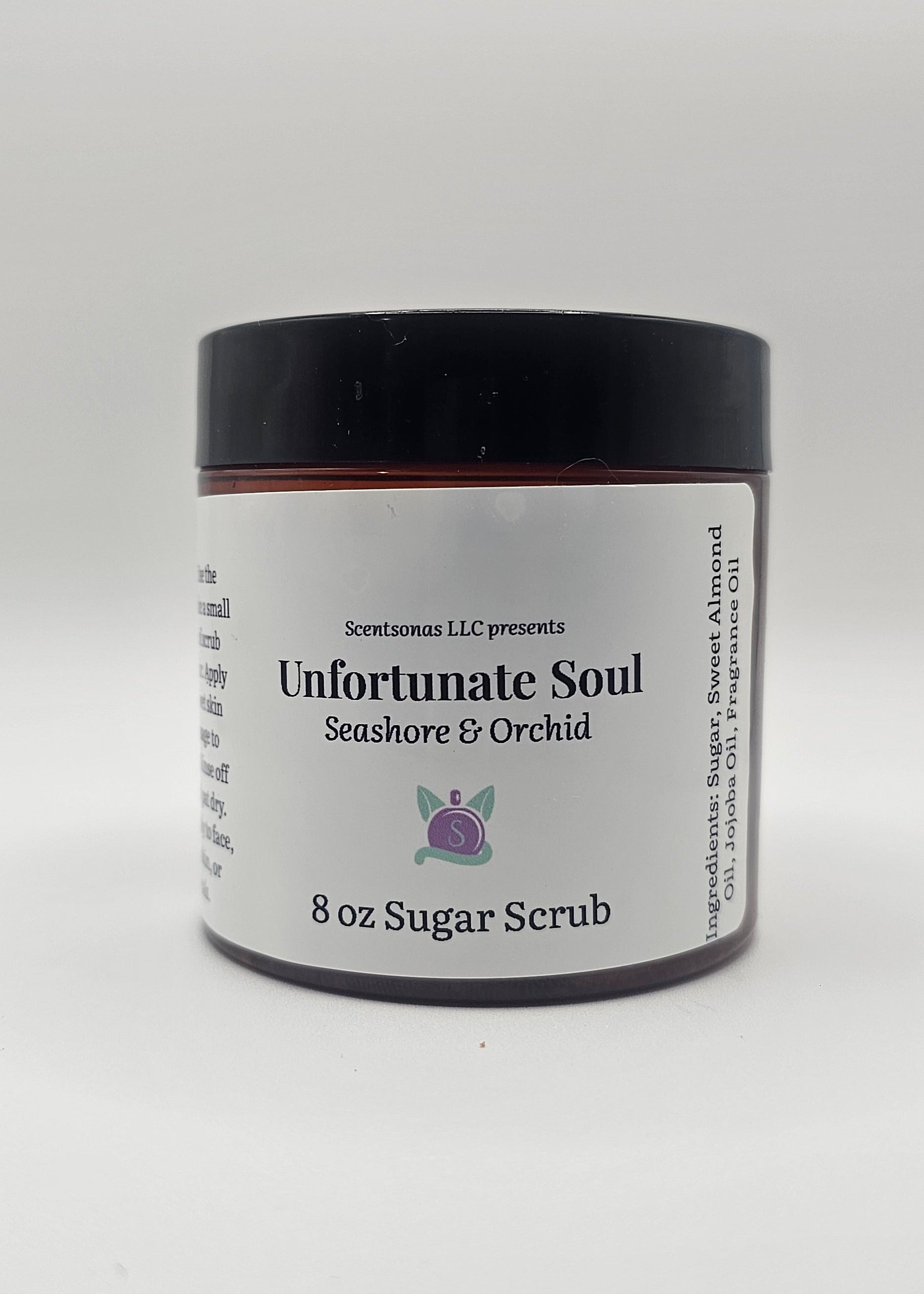 Jar of sugar scrub with a black lid on a white background