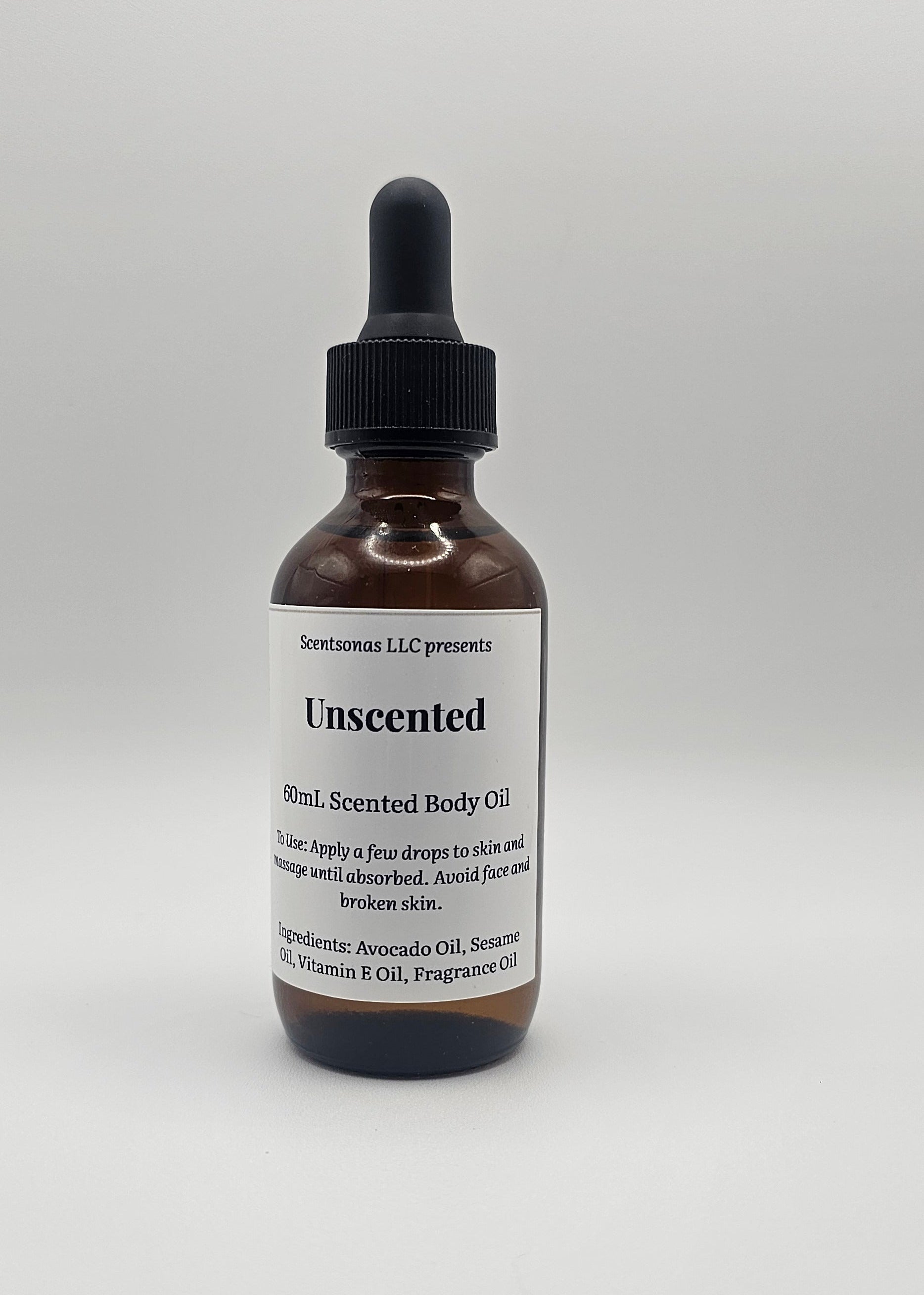 Bottle of Unscented body oil on a light gray background