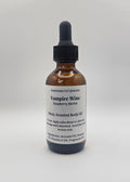 Bottle of Vampire Wine Raspberry Merlot body oil on a white background