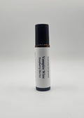 Roll-on bottle labeled 'Vampire Wine Raspberry Merlot' on a light gray background