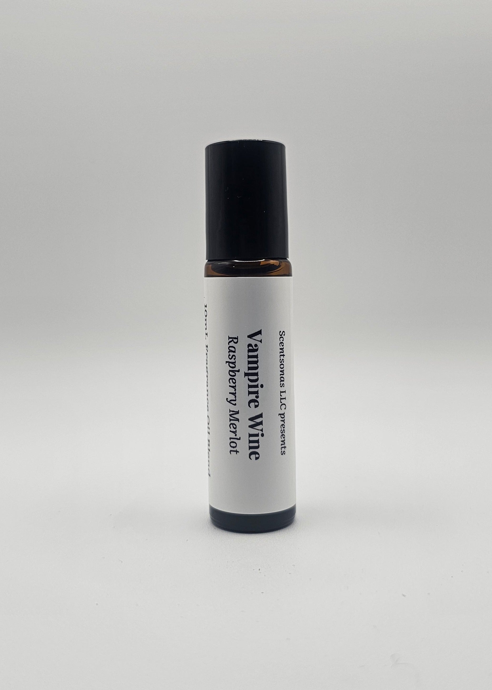 Roll-on bottle labeled 'Vampire Wine Raspberry Merlot' on a light gray background