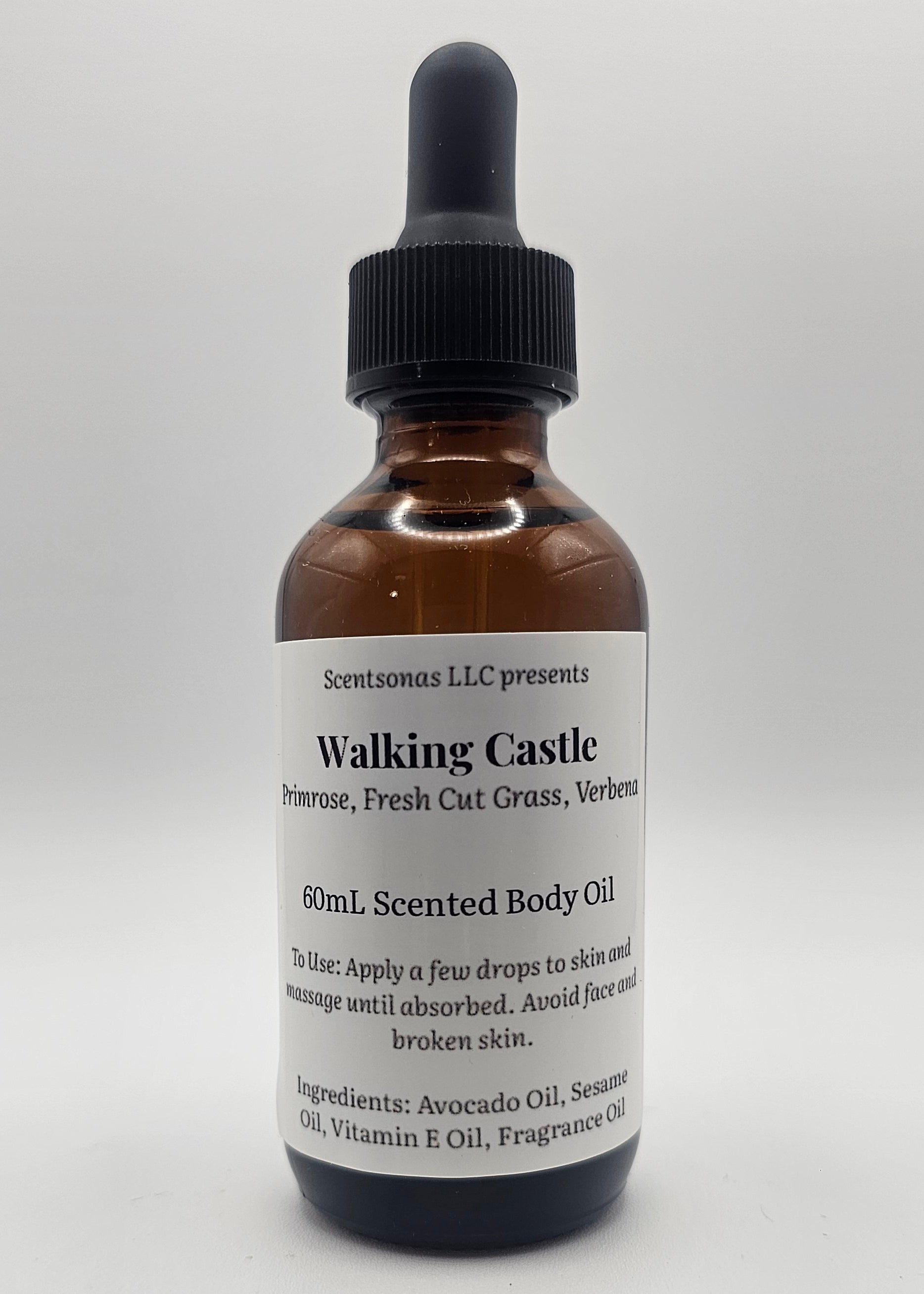 Bottle of walking castle body oil with a dropper on a white background